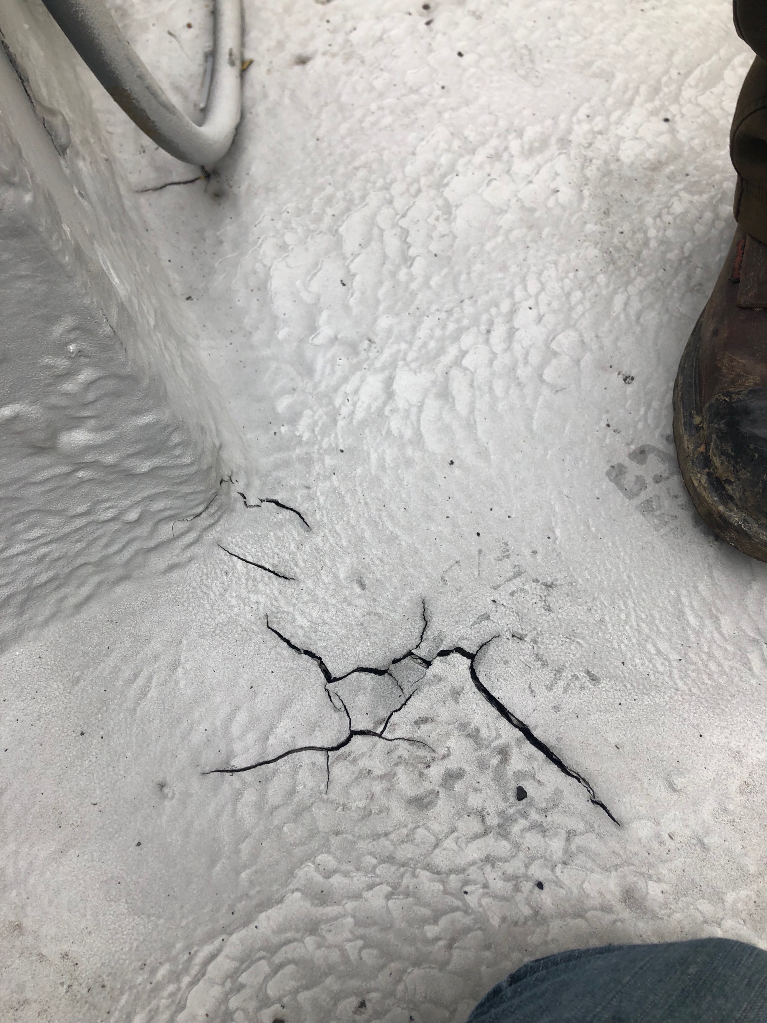 Coating applied over an asphalt surface with primer